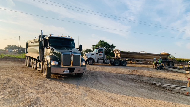 end dump and super dump at a pit